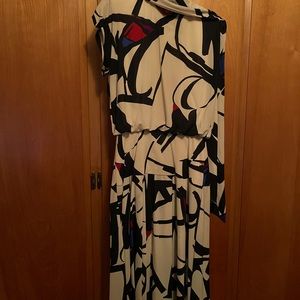 COUTURE bold print event or professional dress.